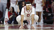 Feb 22, 2025; Norman, Oklahoma, USA; Oklahoma Sooners guard Jeremiah Fears (0) during a break in play against the Mississippi State Bulldogs during the second half at Lloyd Noble Center. Mandatory Credit: Alonzo Adams-Imagn Images