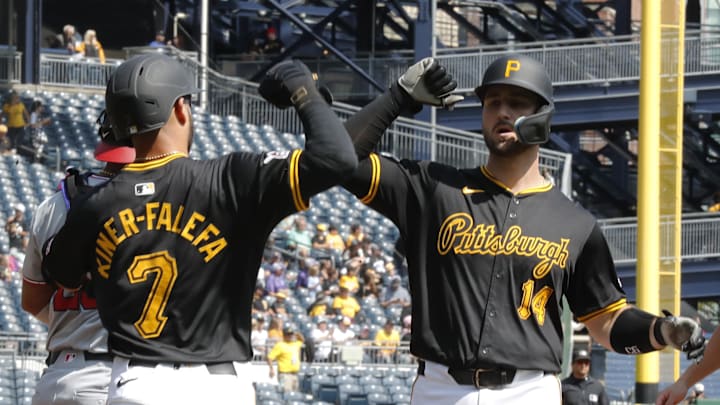 Pittsburgh Pirates third baseman Isiah Kiner-Falefa (7) greets catcher Joey Bart (14) crossing home plate on a two-run home run against the Washington Nationals during the first inning at PNC Park. Pittsburgh Pirates third baseman Isiah Kiner-Falefa (7) greets catcher Joey Bart (14) crossing home plate on a two-run home run against the Washington Nationals during the first inning at PNC Park.