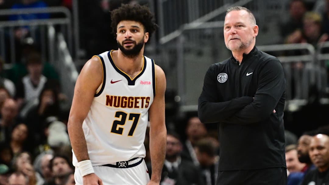 Feb 27, 2025; Milwaukee, Wisconsin, USA; Denver Nuggets head coach Michael Malone and guard Jamal Murray (27) look on in the fourth quarter against the Milwaukee Bucks at Fiserv Forum. Mandatory Credit: Benny Sieu-Imagn Images