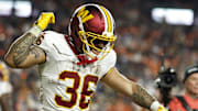 Nov 30, 2025; Landover, Maryland, USA; Washington Commanders running back Chris Rodriguez Jr. (36) celebrates after scoring a touchdown against the Denver Broncos in the second quarter at Northwest Stadium. Mandatory Credit: Geoff Burke-Imagn Images