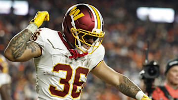 Nov 30, 2025; Landover, Maryland, USA; Washington Commanders running back Chris Rodriguez Jr. (36) celebrates after scoring a touchdown against the Denver Broncos in the second quarter at Northwest Stadium. Mandatory Credit: Geoff Burke-Imagn Images