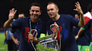 Xavi Hernández (left) and Andrés Iniesta won four Champions League titles together at Barcelona.