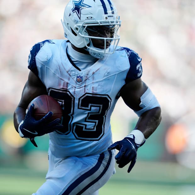 Dallas Cowboys running back Javonte Williams runs into the end zone an after completing a pass, for another touchdown