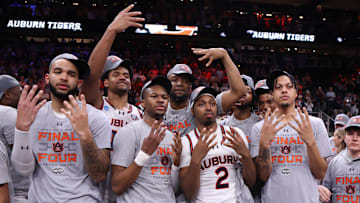 Mar 30, 2025; Atlanta, GA, USA; Auburn Tigers celebrate after winning the South Regional final of the 2025 NCAA tournament against the Michigan State Spartans at State Farm Arena. Mandatory Credit: Brett Davis-Imagn Images
