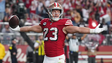 Oct 19, 2025; Santa Clara, California, USA; San Francisco 49ers running back Christian McCaffrey (23) celebrates after a touchdown during the second quarter against the Atlanta Falcons at Levi's Stadium. Mandatory Credit: Kyle Terada-Imagn Images