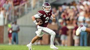 Sep 13, 2025; Starkville, Mississippi, USA; Mississippi State Bulldogs quarterback Blake Shapen (2) scrambles with the ball during the first half against the Alcorn State Braves at Davis Wade Stadium at Scott Field. Mandatory Credit: Wesley Hale-Imagn Images