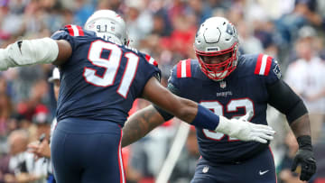 Sep 25, 2022; Foxborough, Massachusetts, USA; New England Patriots nose tackle Davon Godchaux (92) reacts during the first half against the Baltimore Ravens at Gillette Stadium. Mandatory Credit: Paul Rutherford-USA TODAY Sports