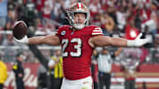 Oct 19, 2025; Santa Clara, California, USA; San Francisco 49ers running back Christian McCaffrey (23) celebrates after a touchdown during the second quarter against the Atlanta Falcons at Levi's Stadium. Mandatory Credit: Kyle Terada-Imagn Images