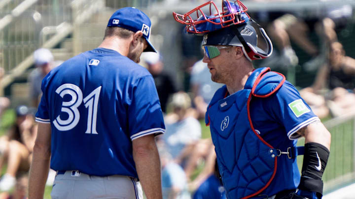 Mar 22, 2025; Fort Myers, Florida, USA; Toronto Blue Jays pitcher Max Scherzer (31)  talking with catcher Tyler Heineman (55) during their game against the Minnesota Twins in the second  inning at at Lee Health Sports Complex. Mandatory Credit: Chris Tilley-Imagn Images