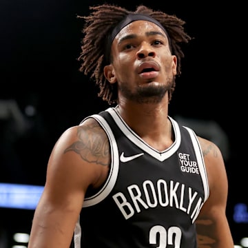 Mar 28, 2025; Brooklyn, New York, USA; Brooklyn Nets center Nic Claxton (33) reacts during the first quarter against the Los Angeles Clippers at Barclays Center. Mandatory Credit: Brad Penner-Imagn Images