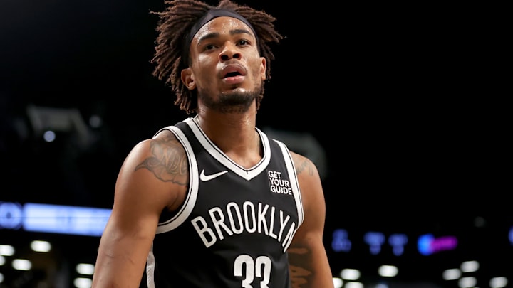 Mar 28, 2025; Brooklyn, New York, USA; Brooklyn Nets center Nic Claxton (33) reacts during the first quarter against the Los Angeles Clippers at Barclays Center. Mandatory Credit: Brad Penner-Imagn Images