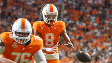 Tennessee quarterback Nico Iamaleava (8) reaches for the ball after a snap during a NCAA game between Tennessee and Kent State in Neyland Stadium in Knoxville on Saturday, Sept. 14, 2024.