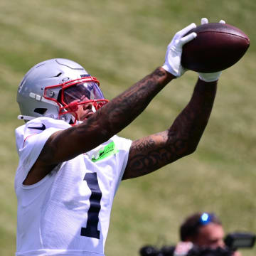 Jun 12, 2024; Foxborough, MA, USA;  New England Patriots wide receiver Ja'Lynn Polk (1) makes a catch at minicamp at Gillette Stadium.  Mandatory Credit: Eric Canha-USA TODAY Sports