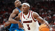 Louisville Cardinals guard Ryan Conwell (3) drives during the first half against visiting Kansas in the exhibition game at the KFC Yum! Center in Louisville, Kentucky Friday, October 24, 2025.