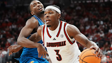 Louisville Cardinals guard Ryan Conwell (3) drives during the first half against visiting Kansas in the exhibition game at the KFC Yum! Center in Louisville, Kentucky Friday, October 24, 2025.
