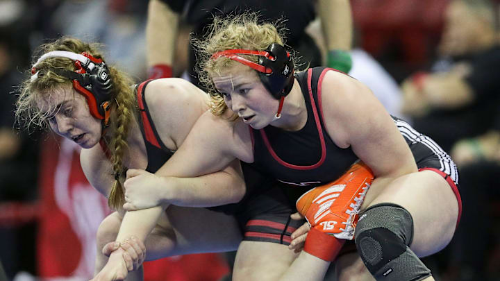 New London High School's Hailie Krueger, right, competes in the girls 152-pound championship match during the WIAA state individual wrestling tournament on Saturday, February 24, 2024, at the Kohl Center in Madison, Wis. Tork Mason/USA TODAY NETWORK-Wisconsin