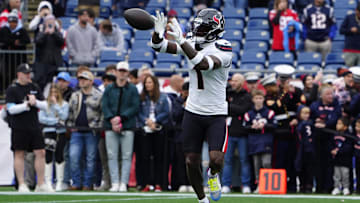 Oct 13, 2024; Foxborough, Massachusetts, USA; Houston Texans wide receiver Stefon Diggs (1) warms up prior to the game against the New England Patriots at Gillette Stadium.