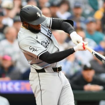 Jun 10, 2024; Seattle, Washington, USA; Chicago White Sox center fielder Luis Robert Jr. (88) hits a 2-run home run against the Seattle Mariners during the sixth inning at T-Mobile Park.