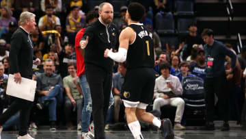 Apr 12, 2024; Memphis, Tennessee, USA; Memphis Grizzlies head coach Taylor Jenkins (left) reacts with Memphis Grizzlies guard Scotty Pippen Jr. (1) during the second half against the Los Angeles Lakers at FedExForum. Mandatory Credit: Petre Thomas-USA TODAY Sports