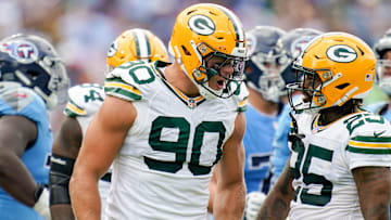 Green Bay Packers defensive end Lukas Van Ness (90) celebrates sacking Tennessee Titans quarterback Will Levis with cornerback Keisean Nixon (25) during the second quarter at Nissan Stadium in Nashville, Tenn., Sunday, Sept. 22, 2024.