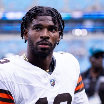 Aug 8, 2025; Charlotte, North Carolina, USA; August 8, 2025: Cleveland Browns quarterback Shedeur Sanders (12) walks off before the game against the Carolina Panthers at Bank of America Stadium. Mandatory Credit: Scott Kinser-The USAToday Network via Imagn Images 