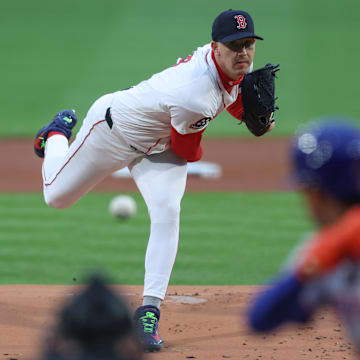 May 20, 2025; Boston, Massachusetts, USA; Boston Red Sox starting pitcher Walker Buehler (0) delivers a pitch during the first inning against the New York Mets at Fenway Park. Mandatory Credit: Paul Rutherford-Imagn Images