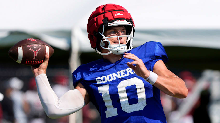 Oklahoma QB John Mateer throws a pass during football practice