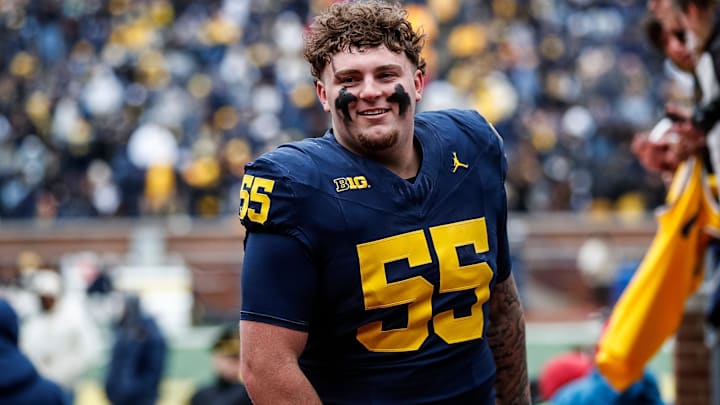 Blue Team defensive lineman Mason Graham (55) walks up the tunnel for halftime during the spring game at Michigan Stadium in Ann Arbor on Saturday, April 20, 2024. Blue Team defensive lineman Mason Graham (55) walks up the tunnel for halftime during the spring game at Michigan Stadium in Ann Arbor on Saturday, April 20, 2024.