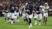 Sep 26, 2025; Charlottesville, Virginia, USA; Virginia Cavaliers running back J'Mari Taylor (3) scores a touchdown against the Florida State Seminoles during the second quarter at Scott Stadium. Mandatory Credit: Geoff Burke-Imagn Images