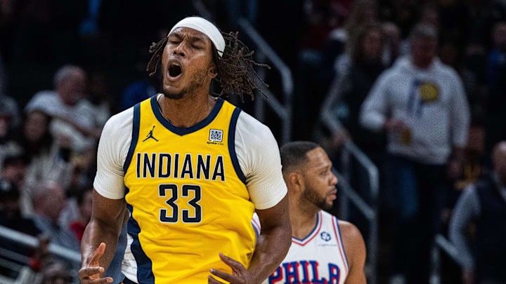 Jan 18, 2025; Indianapolis, Indiana, USA; Indiana Pacers center Myles Turner (33) reacts to a made basket  in the second half against the Philadelphia 76ers at Gainbridge Fieldhouse. Mandatory Credit: Trevor Ruszkowski-Imagn Images