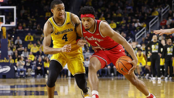 Jan 15, 2024; Ann Arbor, Michigan, USA; Ohio State Buckeyes guard Roddy Gayle Jr. (1) dribbles as Michigan Wolverines guard Nimari Burnett (4) defends in the second half at Crisler Center. Mandatory Credit: Rick Osentoski-USA TODAY Sports