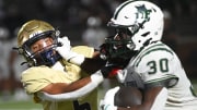 The Spartanburg Vikings played the Dutch Fork Silver Foxes in high school football at Spartanburg High School on Aug. 30, 2024. Spartanburg's Adrian Miller (6) fights Dutch Fork's Maurice Anderson (30) on a play. The Silver Foxes won, 24-7.