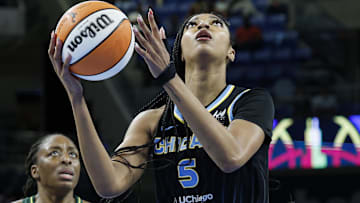 Aug 19, 2025; Chicago, Illinois, USA; Chicago Sky forward Angel Reese (5) drives to the basket against the Seattle Storm during the first half at Wintrust Arena. Mandatory Credit: Kamil Krzaczynski-Imagn Images