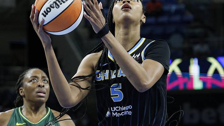 Aug 19, 2025; Chicago, Illinois, USA; Chicago Sky forward Angel Reese (5) drives to the basket against the Seattle Storm during the first half at Wintrust Arena. Mandatory Credit: Kamil Krzaczynski-Imagn Images