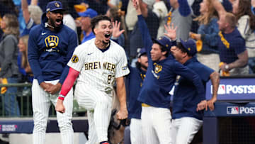 Milwaukee Brewers shortstop Willy Adames (27) reacts to Milwaukee Brewers right fielder Sal Frelick’s (10) homer (1) on a fly ball to right field during the seventh inning of Game 3 of National League wild-card series against the New York Mets on Thursday October 3, 2024 at American Family Field in Milwaukee, Wis.