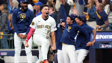 Oct 3, 2024; Milwaukee, Wisconsin, USA; Milwaukee Brewers shortstop Willy Adames (27) reacts to Milwaukee Brewers outfielder Sal Frelick (10) home run on a fly ball to right field during the seventh inning of Game 3 of National League wild-card series against the New York Mets on Thursday October 3, 2024 at American Family Field in Milwaukee, Wis. Mandatory Credit: Jovanny Hernandez/USA TODAY Network via Imagn Images