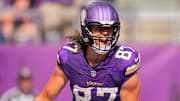 Sep 21, 2025; Minneapolis, Minnesota, USA; Minnesota Vikings tight end TJ. Hockenson (87) catches a touchdown pass against the Cincinnati Bengals during the second half at U.S. Bank Stadium. 