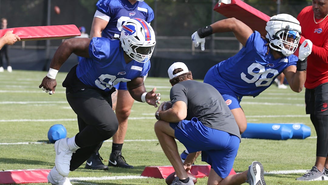 Bills defensive tackles Larry Ogunjobi and Deone Walker explode off the line during drills during the second day of Buffalo Bills training camp at St. John Fisher University Thursday, July 24, 2025 in Pittsford.