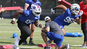 Bills defensive tackles Larry Ogunjobi and Deone Walker explode off the line during drills during the second day of Buffalo Bills training camp at St. John Fisher University Thursday, July 24, 2025 in Pittsford.