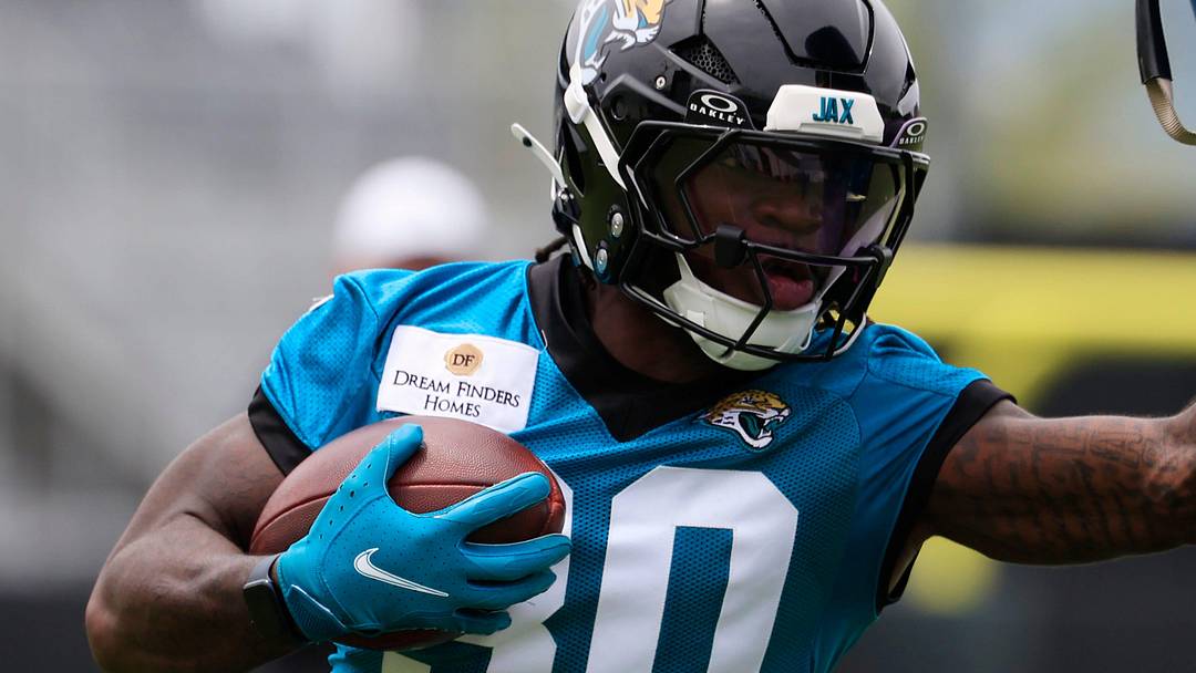Jacksonville Jaguars running back J'Mari Taylor (30) hits a blocking pad during rookie minicamp at the Miller Electric Center, Saturday, May 9, 2026 in Jacksonville, Fla. Jacksonville Jaguars running back J'Mari Taylor (30) hits a blocking pad during rookie minicamp at the Miller Electric Center, Saturday, May 9, 2026 in Jacksonville, Fla.