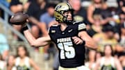 Purdue Boilermakers quarterback Ryan Browne (15) throws a pass