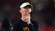 Nov 7, 2025; Los Angeles, California, USA; Southern California Trojans head coach Lincoln Riley watches game action against the Northwestern Wildcats during the second half at the Los Angeles Memorial Coliseum. Mandatory Credit: Gary A. Vasquez-Imagn Images