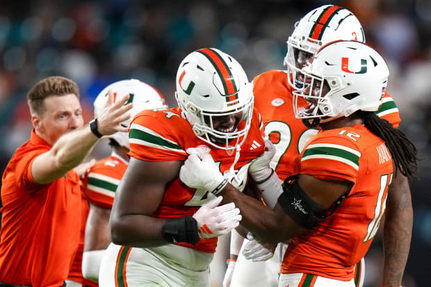 Miami defensive lineman Rueben Bain Jr. (44).