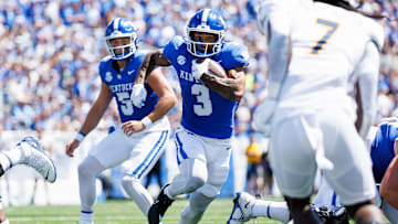 Aug 30, 2025; Lexington, Kentucky, USA; Kentucky Wildcats running back Seth McGowan (3) runs the ball during the first quarter against the Toledo Rockets at Kroger Field. Mandatory Credit: Jordan Prather-Imagn Images