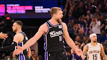 Feb 8, 2025; Sacramento, California, USA; Sacramento Kings center Domantas Sabonis (11) celebrates with teammates after a play against the New Orleans Pelicans during the fourth quarter at Golden 1 Center. Mandatory Credit: Kelley L Cox-Imagn Images