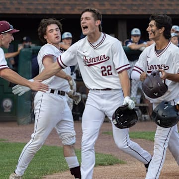 Don Bosco’s Nick Becker is greeted at home after hitting a two-run homer to put his team up, 2-0, on June 11, 2025. Don Bosco Prep defeats Christian Brothers Academy, 5-4, in an 11-inning game for Non-Public A baseball title at Veterans Park in Hamilton. This game began on June 11 and was completed on June 12. It was suspended with a 4-4 tie at the end of eight innings due to township rules about park lights.