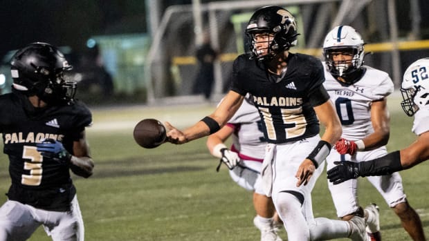 Crew Colon hands the ball off to Jadin Johnson. Paramus Catholic football hosts Seton Hall Prep 