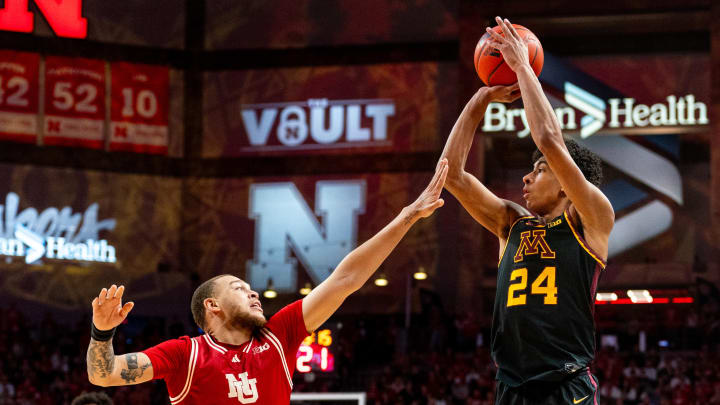 Minnesota guard Cam Christie (24) shoots a 3-point shot against Nebraska guard C.J. Wilcher (0) during the second half at Pinnacle Bank Arena in Lincoln, Neb., on Feb. 25, 2024.