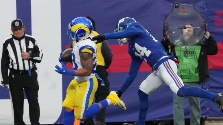 East Rutherford, NJ     December 31, 2023 -- Kyren Williams of the Rams scores a TD past Dane Belton of the Giants in the second half. The Los Angeles Rams edged the New York Giants 26-25 on December 31, 2023 at MetLife Stadium in East Rutherford, NJ.