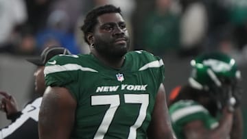 East Rutherford, NJ     December 3, 2023 -- Mekhi Becton of the Jets coming off the field in the